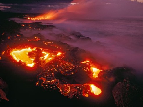 A maelstrom of lava from Kilauea swirls before flowing into the ocean near Kamo amoa village and campground.